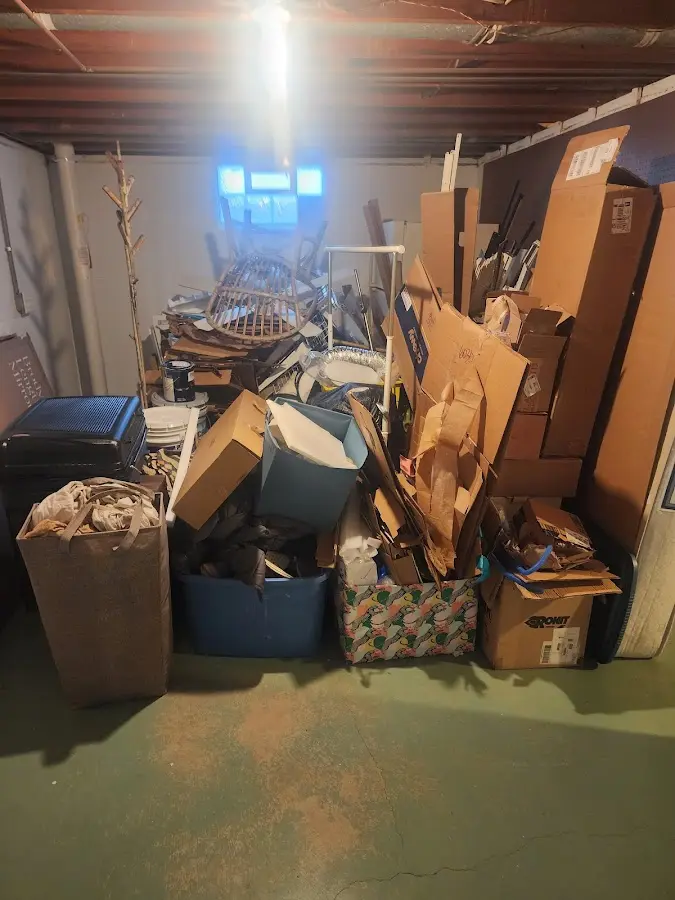 Roll-off dumpster container at job site for 4 Yard Dumpster Rental in Kelly